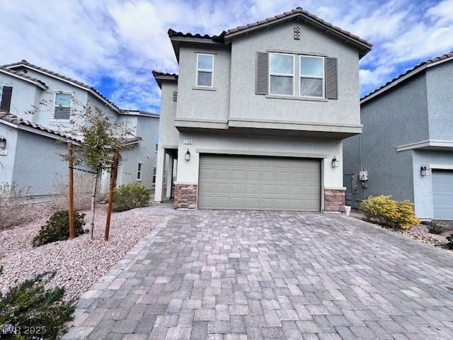 view of front of home with a garage