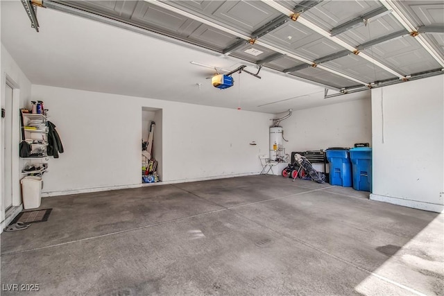 garage with a garage door opener and water heater