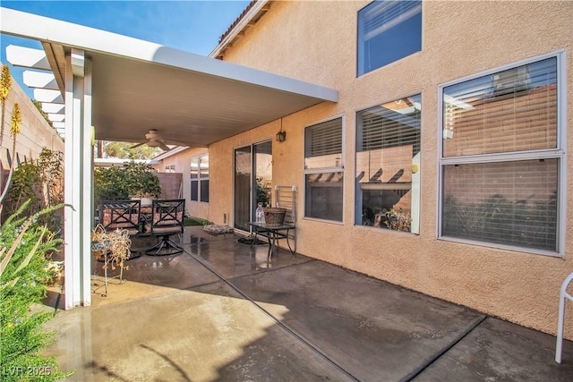 view of patio / terrace with ceiling fan