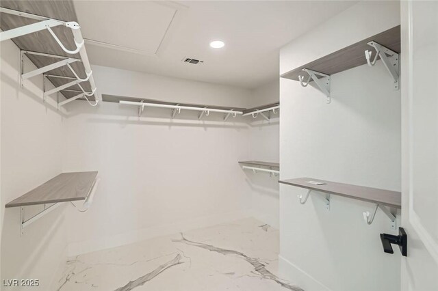 4961 Tierra Del Sol Dr, Las Vegas, NV 89113 - spacious closet with marble finish floors