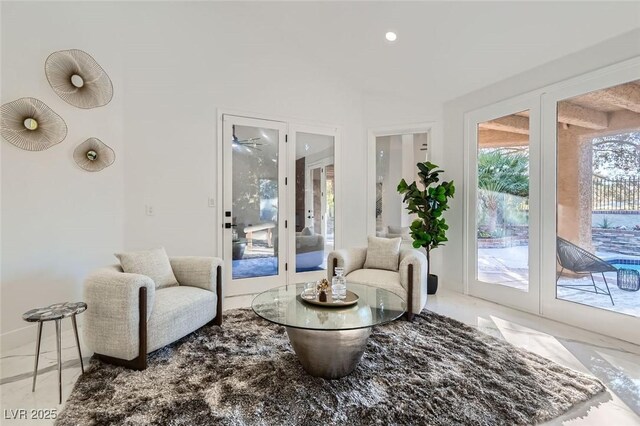 4961 Tierra Del Sol Dr, Las Vegas, NV 89113 - living area with recessed lighting and french doors