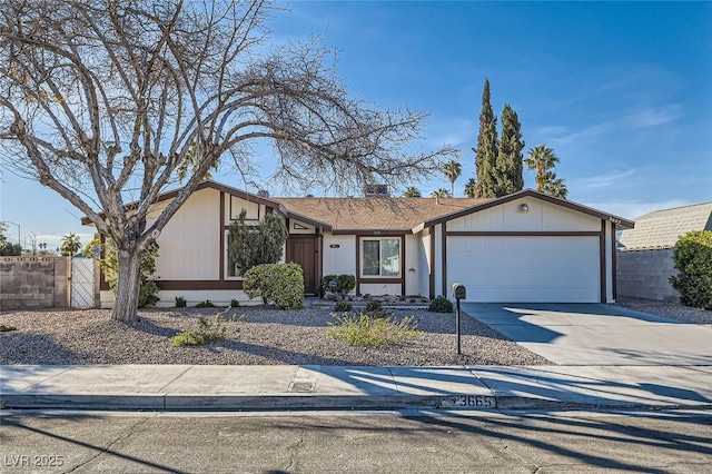 single story home featuring a garage