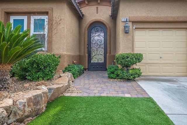 doorway to property with stucco siding