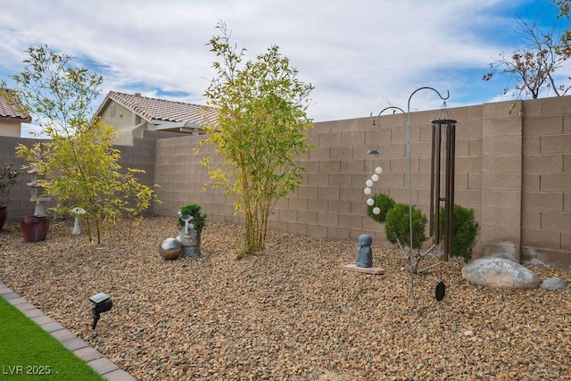 view of yard featuring fence