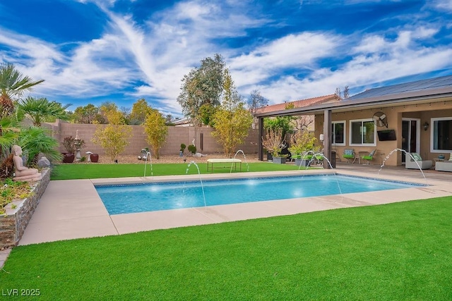 view of pool featuring a lawn, a patio area, a fenced backyard, and a fenced in pool