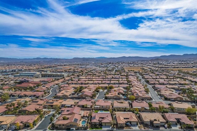 drone / aerial view with a residential view and a mountain view