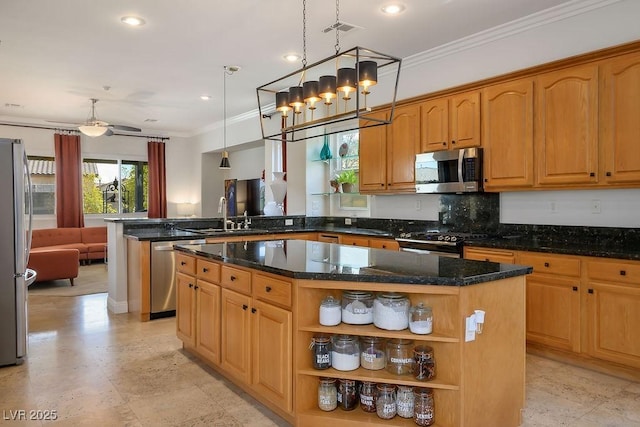 kitchen with a kitchen island, appliances with stainless steel finishes, a peninsula, hanging light fixtures, and open shelves