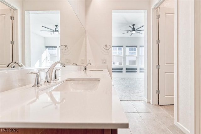 bathroom featuring ceiling fan, tile patterned flooring, and vanity