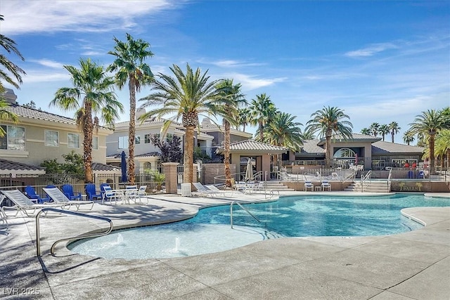 view of pool featuring a patio area and pool water feature