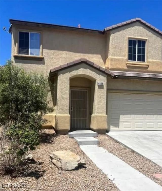 view of front of house with a garage