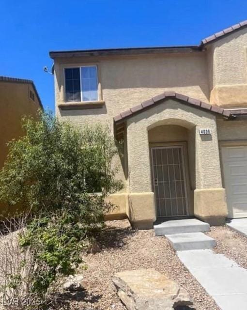 property entrance with a garage