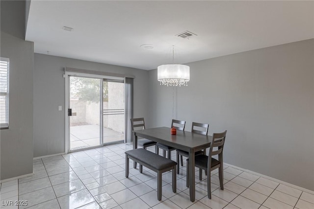 6250 W Flamingo Rd Unit 7, Las Vegas, NV 89103 - tiled dining space with a chandelier