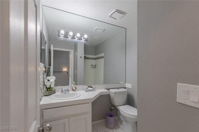 6250 W Flamingo Rd Unit 7, Las Vegas, NV 89103 - bathroom featuring tile patterned flooring, a shower, vanity, and toilet