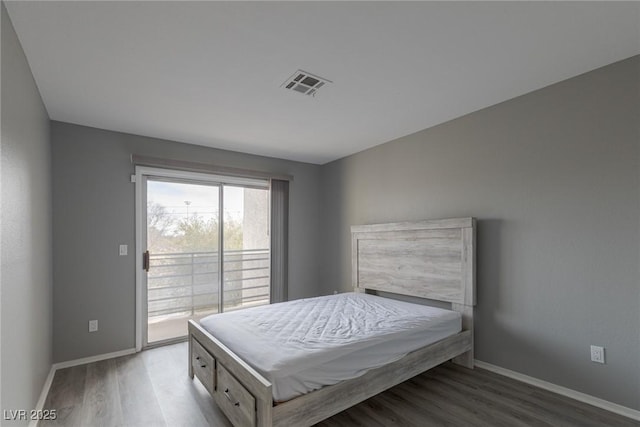 6250 W Flamingo Rd Unit 7, Las Vegas, NV 89103 - bedroom featuring hardwood / wood-style flooring and access to outside