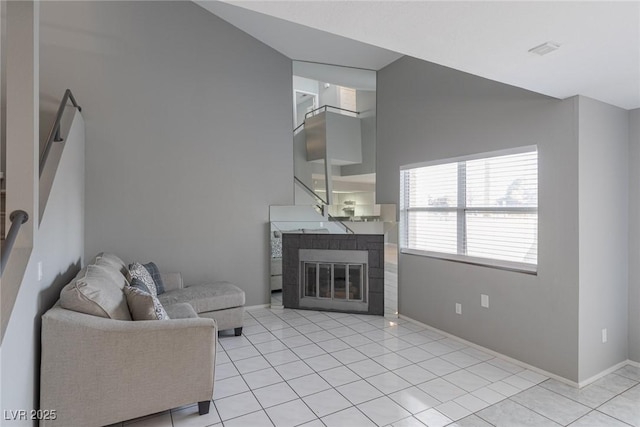 6250 W Flamingo Rd Unit 7, Las Vegas, NV 89103 - tiled living room featuring lofted ceiling