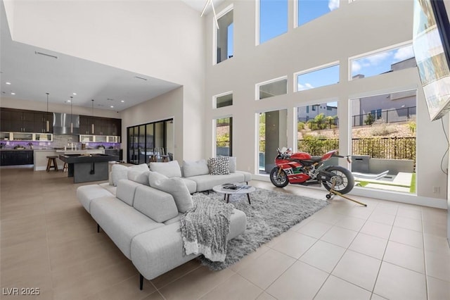 living area featuring light tile patterned floors