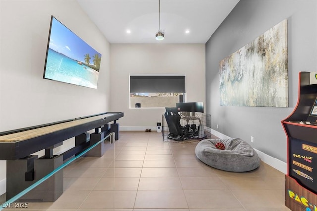 recreation room featuring recessed lighting, baseboards, and tile patterned floors