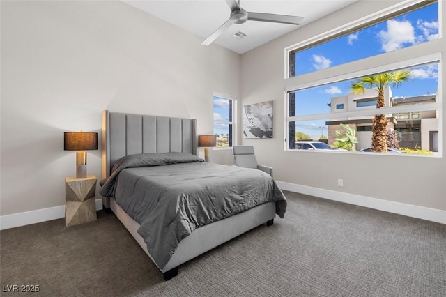 bedroom featuring carpet floors, visible vents, and baseboards