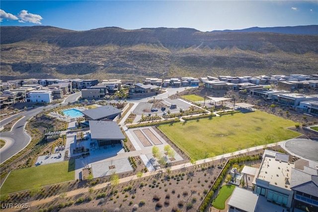 bird's eye view with a mountain view