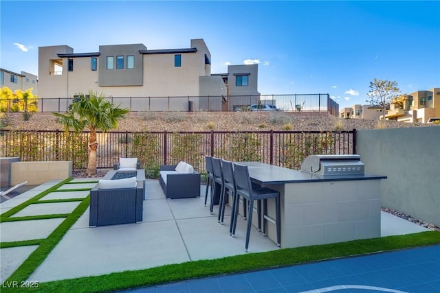 view of patio featuring outdoor dry bar, an outdoor living space, fence, and grilling area