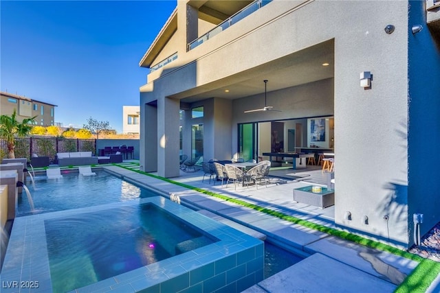 view of pool featuring outdoor lounge area, a ceiling fan, outdoor dining space, a patio area, and fence