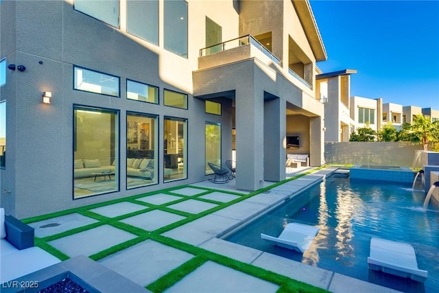 view of pool with a fenced in pool and a patio