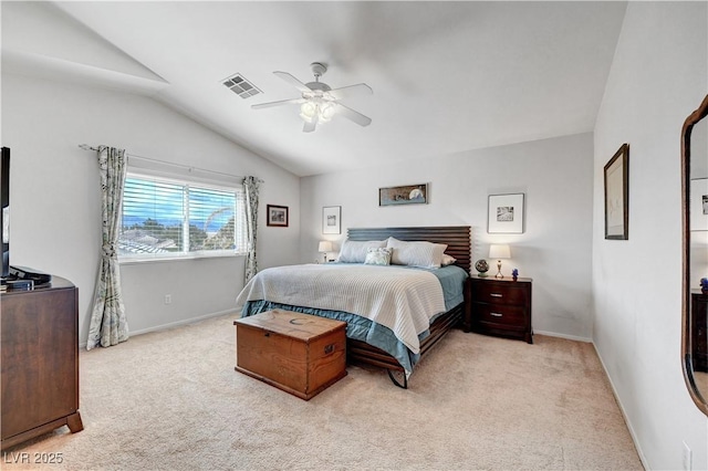 carpeted bedroom with lofted ceiling and ceiling fan