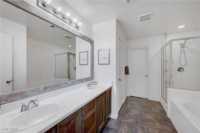 bathroom featuring plus walk in shower and vanity