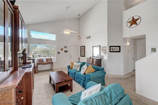 living room featuring light carpet, lofted ceiling, and ceiling fan