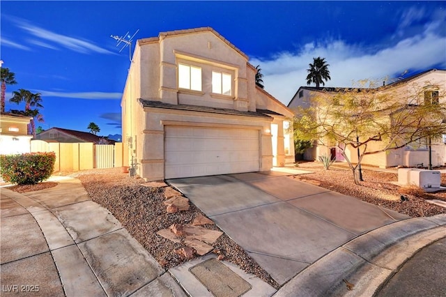 view of front of property with a garage