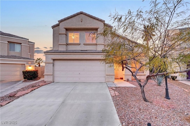 view of front of property featuring a garage