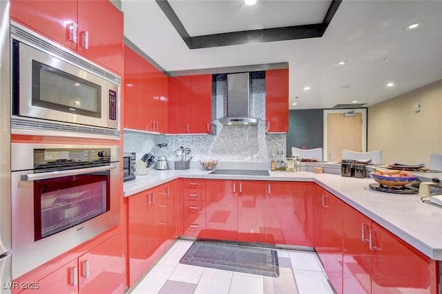 kitchen featuring wall chimney range hood, appliances with stainless steel finishes, light tile patterned flooring, and decorative backsplash