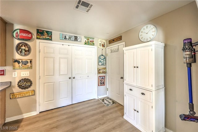 bedroom with light hardwood / wood-style floors