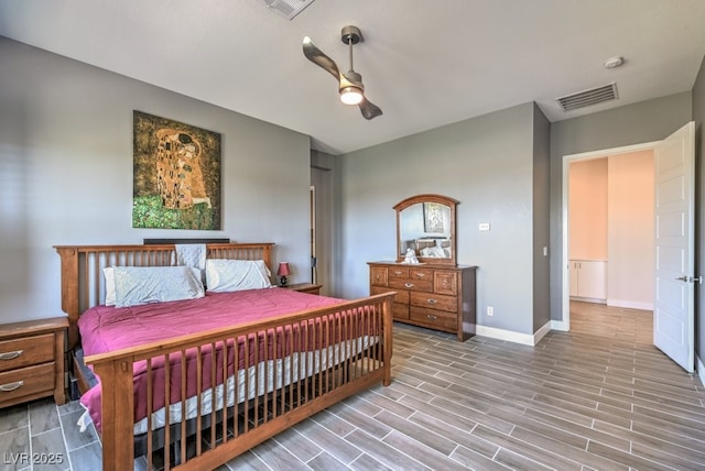 bedroom with light wood-type flooring and ceiling fan