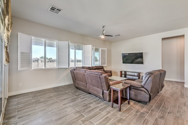 living room featuring ceiling fan