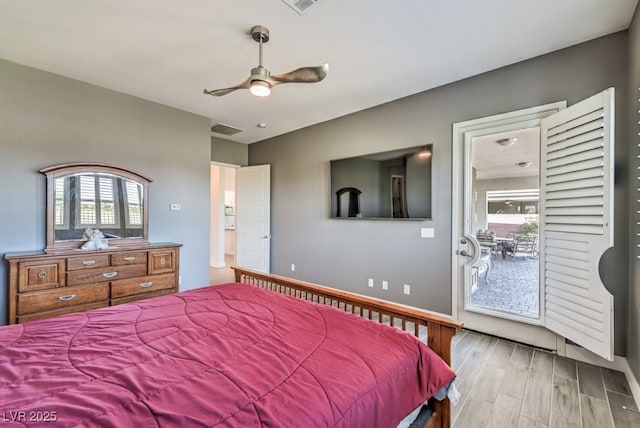 bedroom with ceiling fan, light hardwood / wood-style floors, and access to outside