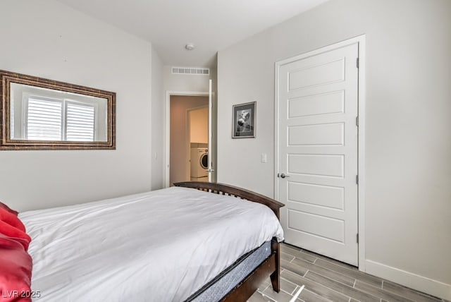 bedroom with washer / clothes dryer