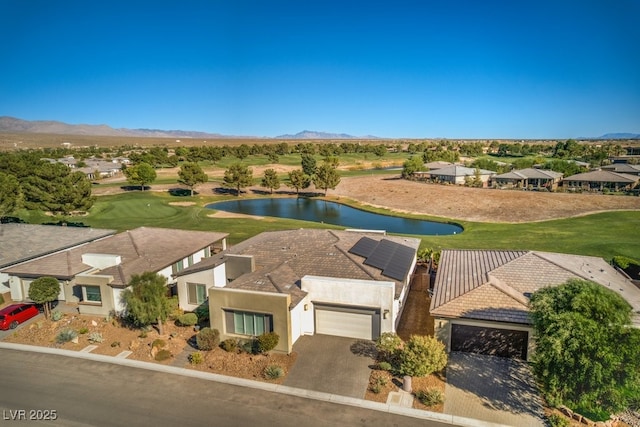 exterior space featuring a water and mountain view