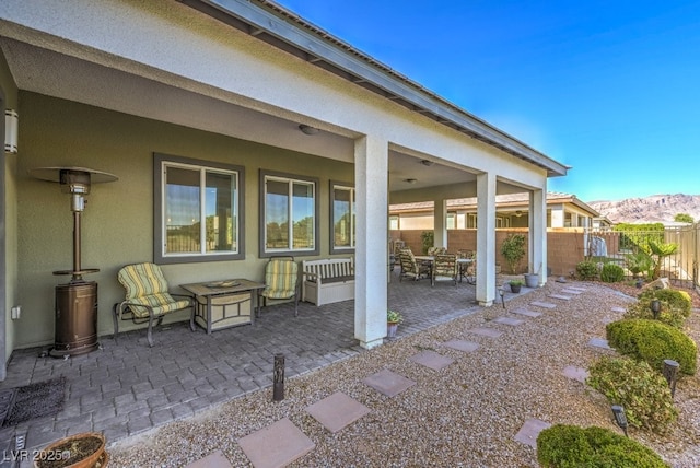 view of patio / terrace featuring a mountain view