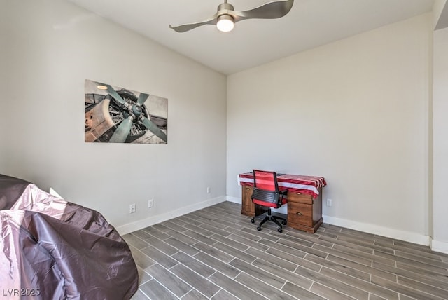 office area featuring ceiling fan and dark hardwood / wood-style floors