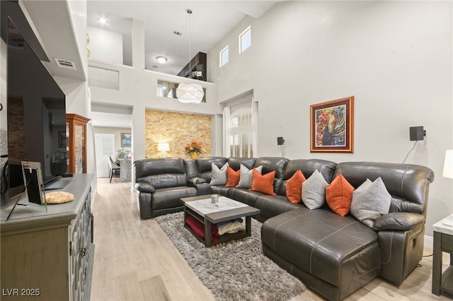 living room with light hardwood / wood-style floors