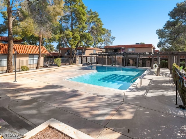 view of pool featuring a patio area