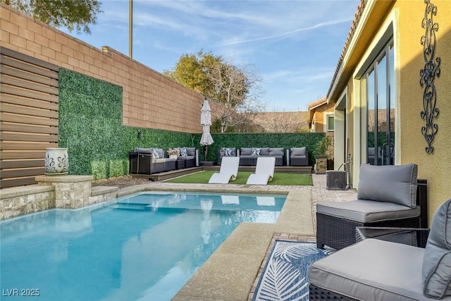 view of pool featuring a patio, outdoor lounge area, and fence