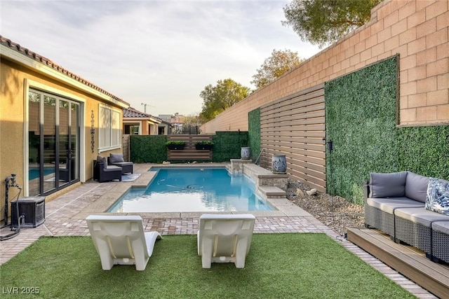 view of swimming pool with a fenced in pool, a patio, a fenced backyard, an outdoor living space, and central AC