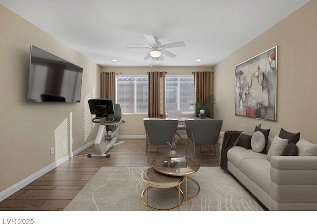 living area featuring a ceiling fan, baseboards, wood finished floors, and recessed lighting