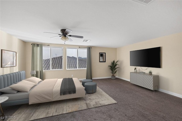 carpeted bedroom with visible vents, baseboards, and a ceiling fan