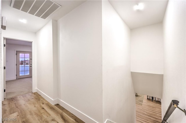 hallway featuring light hardwood / wood-style floors