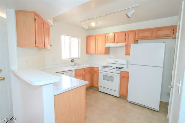 kitchen featuring sink, kitchen peninsula, white appliances, and light brown cabinetry