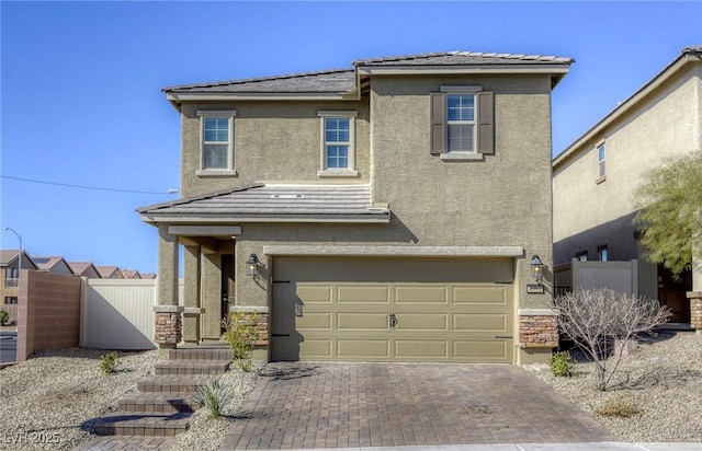 front facade with a garage