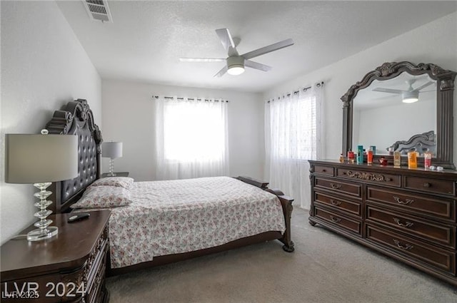 bedroom featuring carpet flooring and ceiling fan